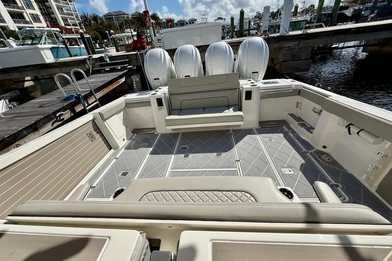 Slide: The Image of 2022 Pursuit S 428 Sport boat interior with spacious seating and modern design. - 24