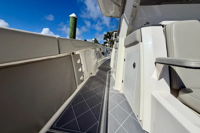 Slide: The Image of 2022 Pursuit S 428 Sport boat deck with sleek design and modern features. - 30