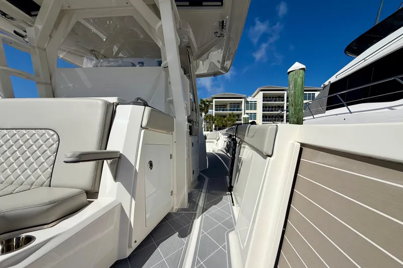 Slide: The Image of 2022 Pursuit S 428 Sport boat interior with luxurious seating and modern design. - 31