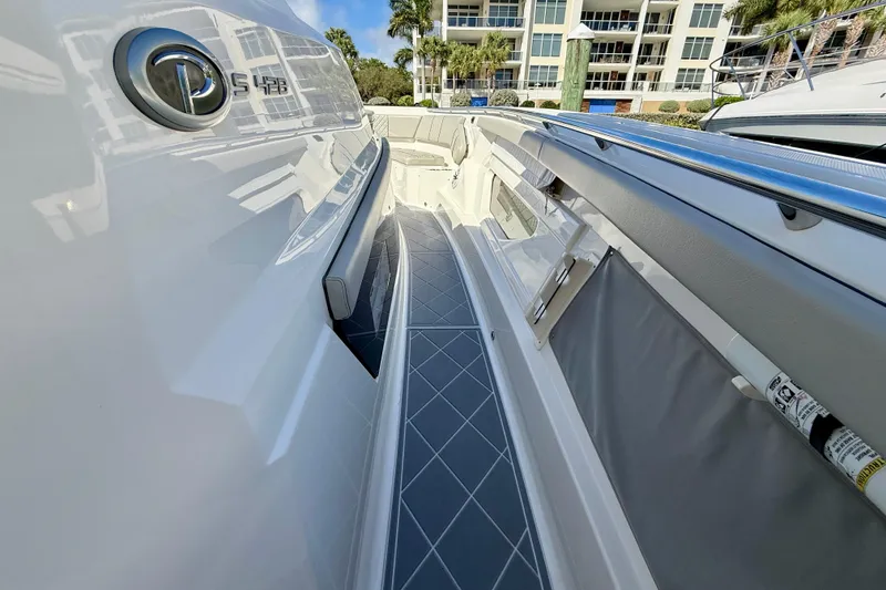 Slide: The Image of 2022 Pursuit S 428 Sport boat deck with sleek design and modern features. - 44