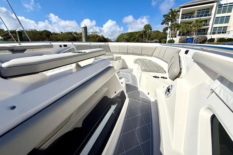 Slide: The Image of 2022 Pursuit S 428 Sport boat interior with luxurious seating and modern design. - 47