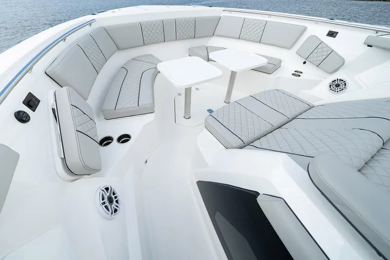 Slide: The Image of 2022 Pursuit S 428 Sport boat cruising on a sunny waterway. - 7