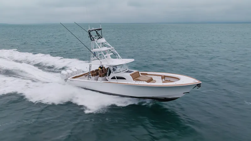 Slide: The Image of 2023 Valhalla Boatworks V-46 cruising on open water, showcasing sleek design and performance. - 3