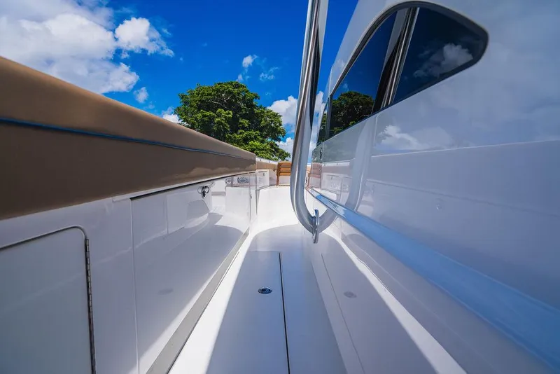 Slide: The Image of 2023 Valhalla Boatworks V-46 deck view under clear blue sky. - 46