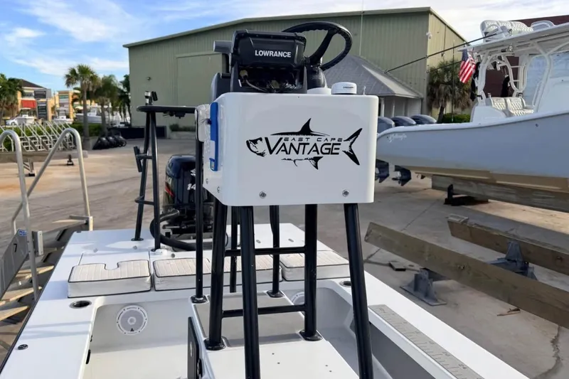 Slide: The Image of 2014 East Cape Vantage VHP boat with Lowrance equipment at a marina. - 10