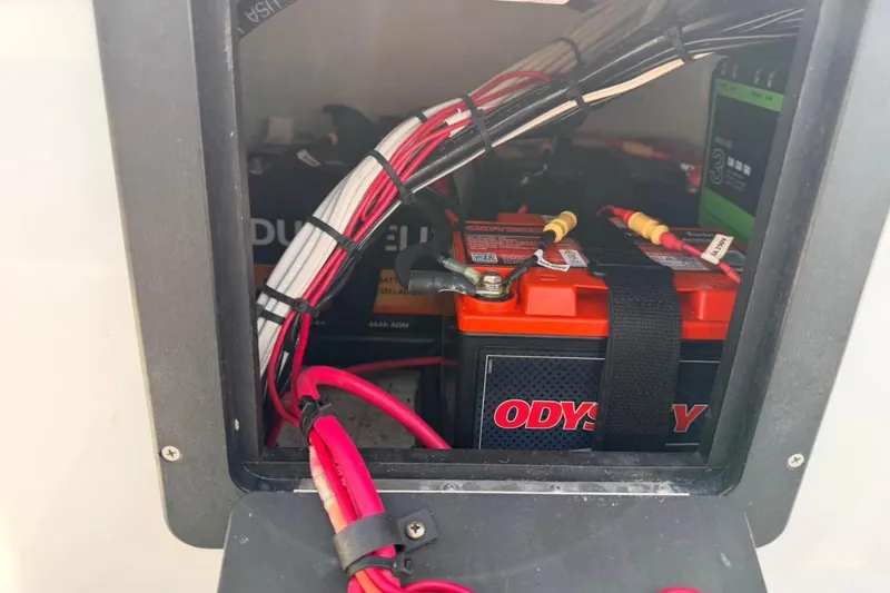 Slide: The Image of Battery compartment of a 2014 East Cape Vantage VHP with Odyssey and Duracell batteries. - 14