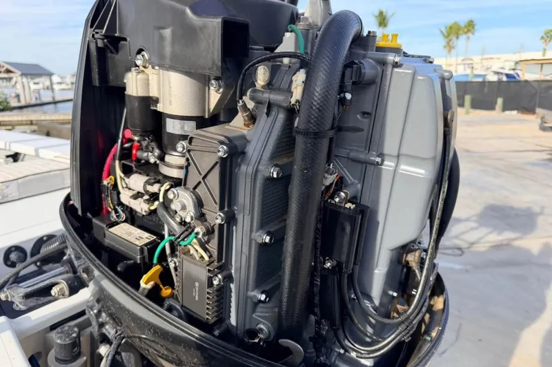 Slide: The Image of 2014 East Cape Vantage VHP boat engine, detailed view of components and wiring. - 19