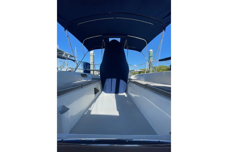 Slide: The Image of 1999 Catalina 36 MkII sailboat cockpit with blue canopy and seating. - 16
