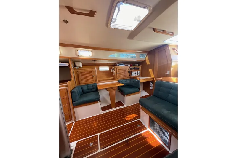 Slide: The Image of Interior of 1999 Catalina 36 MkII sailboat with wood finish and seating area. - 34