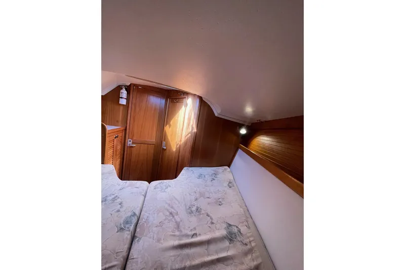 Slide: The Image of Cozy cabin interior of 1999 Catalina 36 MkII sailboat with wooden finishes. - 36