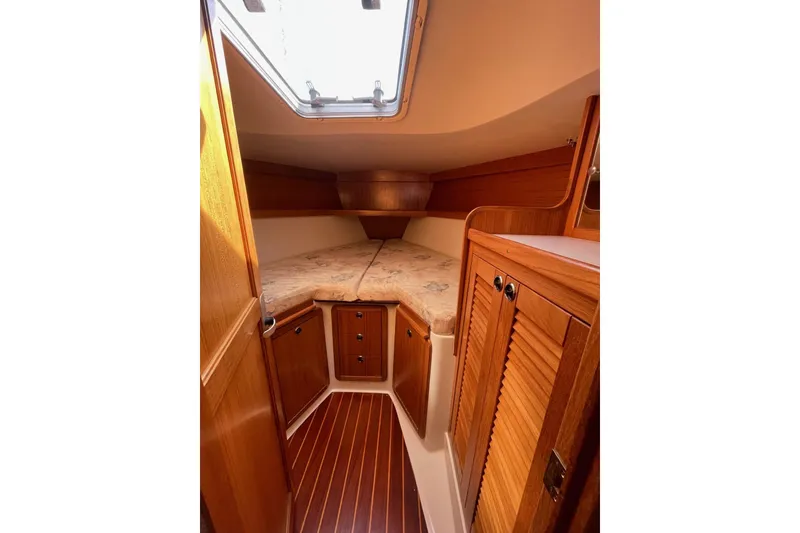 Slide: The Image of Interior cabin of 1999 Catalina 36 MkII sailboat with wooden finish and cozy berth. - 37