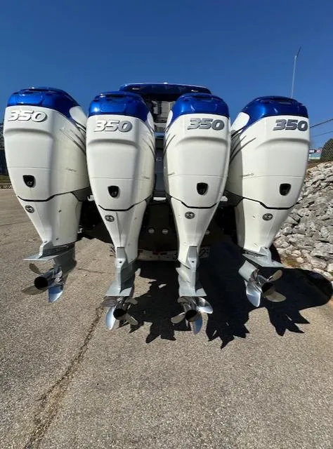 Slide: The Image of 2019 Mystic Powerboats M4200 with four 350 horsepower outboard engines. - 30