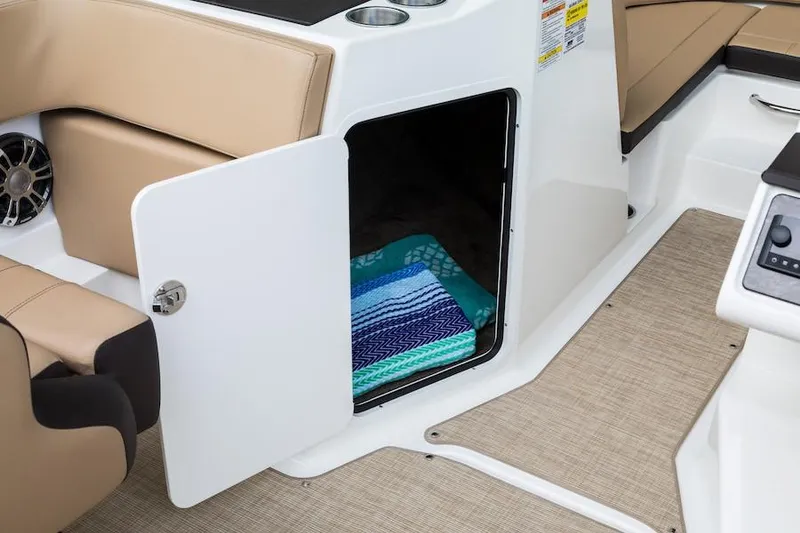 Slide: The Image of 2021 Sea Ray SPX 210 boat with comfortable rear seating and sleek design. - 12