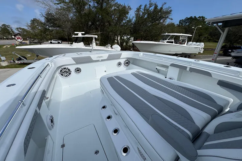 Slide: The Image of 2026 Invincible 46 Catamaran with spacious deck and modern seating. - 20