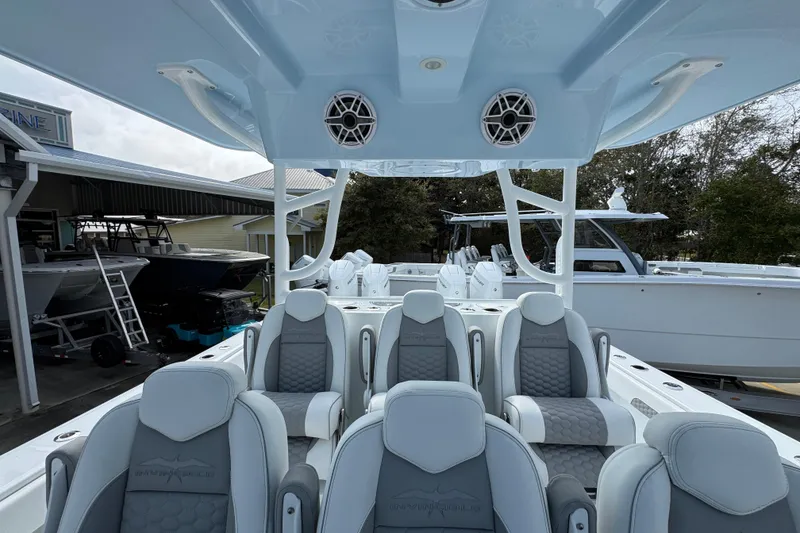 Slide: The Image of 2026 Invincible 46 Catamaran interior with luxury seating and modern design features. - 27