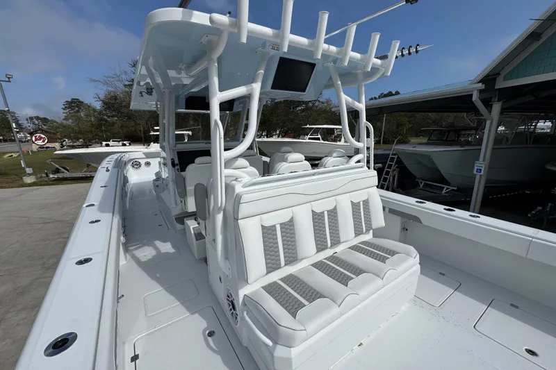 Slide: The Image of 2026 Invincible 46 Catamaran with sleek white seating and modern design features. - 35