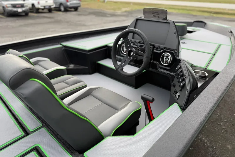 Slide: The Image of 2026 Xpress H18 boat interior with modern dashboard and sleek seating design. - 8