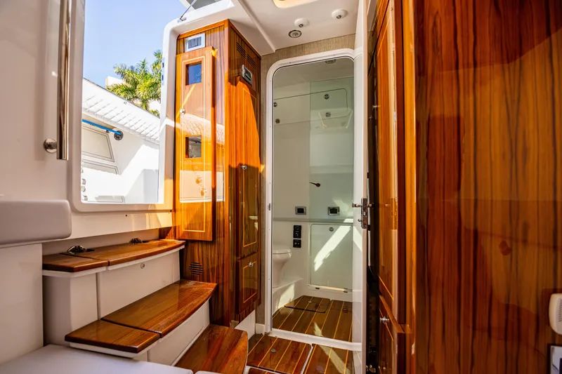 Slide: The Image of Luxurious interior of 2024 HCB 53 Suenos yacht with polished wood finishes. - 17