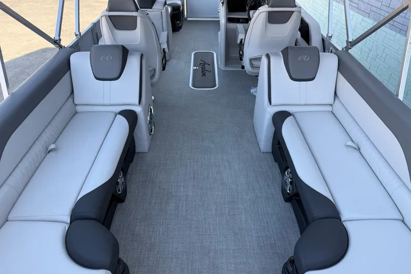 Slide: The Image of 2024 Avalon LSZ Quad Lounge 25' interior with luxurious seating and modern design. - 5