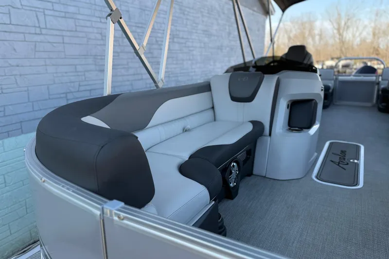 Slide: The Image of 2024 Avalon LSZ Quad Lounge 25' interior with sleek seating and modern design. - 8