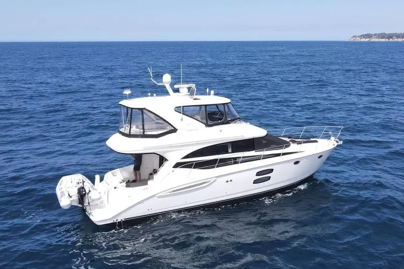 The Image of 2013 Meridian 441 Sedan yacht cruising on open sea. - 0