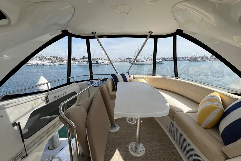 Slide: The Image of Interior of 2013 Meridian 441 Sedan yacht with seating and marina view. - 10