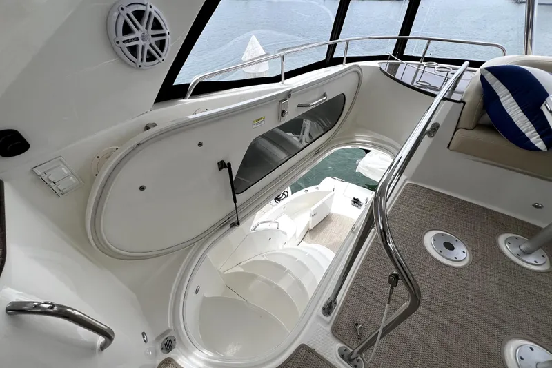 Slide: The Image of Interior view of 2013 Meridian 441 Sedan yacht with open hatch and stairs. - 11
