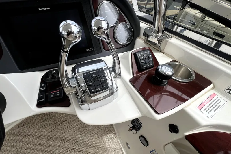 Slide: The Image of Control panel of a 2013 Meridian 441 Sedan yacht with navigation instruments. - 19