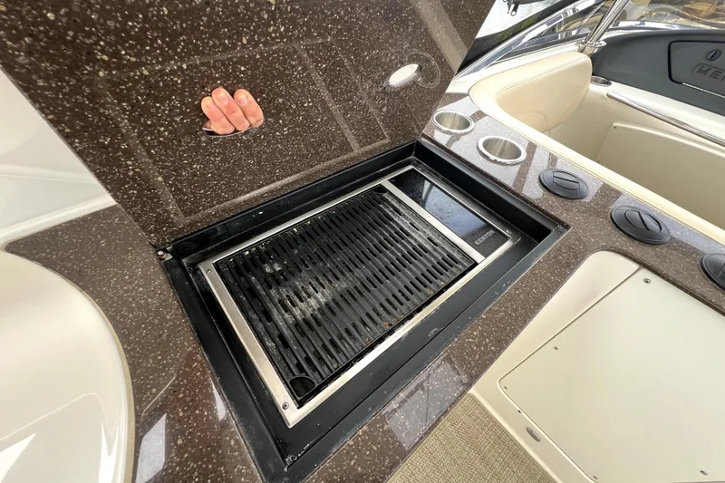 Slide: The Image of Built-in grill on 2013 Meridian 441 Sedan yacht with sleek countertop design. - 24