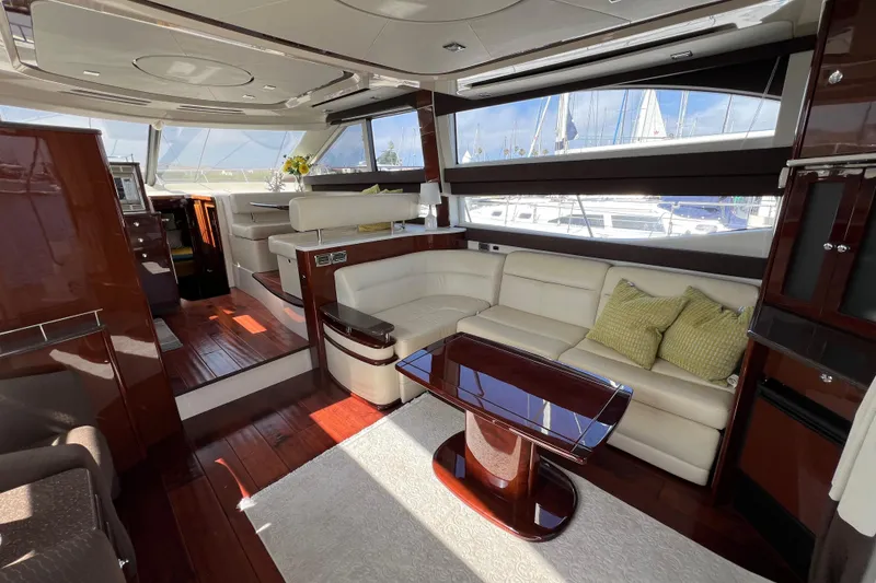 Slide: The Image of Luxurious interior of 2013 Meridian 441 Sedan yacht with elegant seating and wooden finishes. - 27