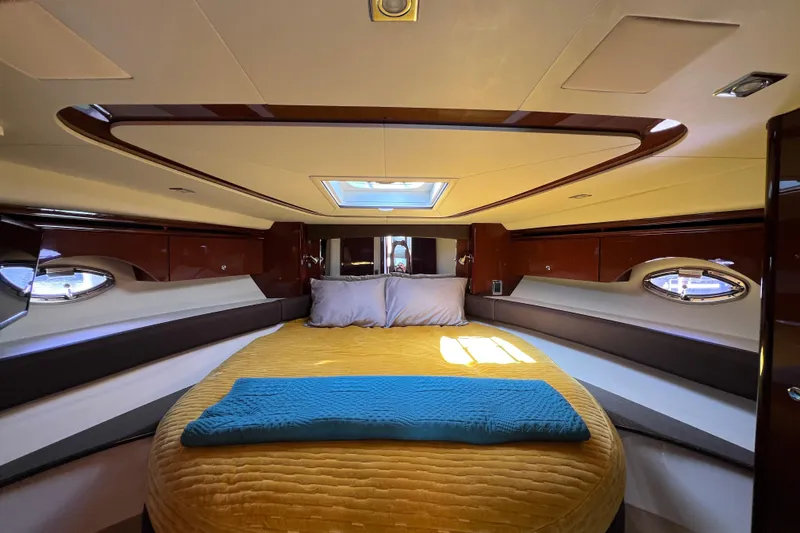 Slide: The Image of Luxurious interior of 2013 Meridian 441 Sedan yacht with cozy bed and elegant design. - 37