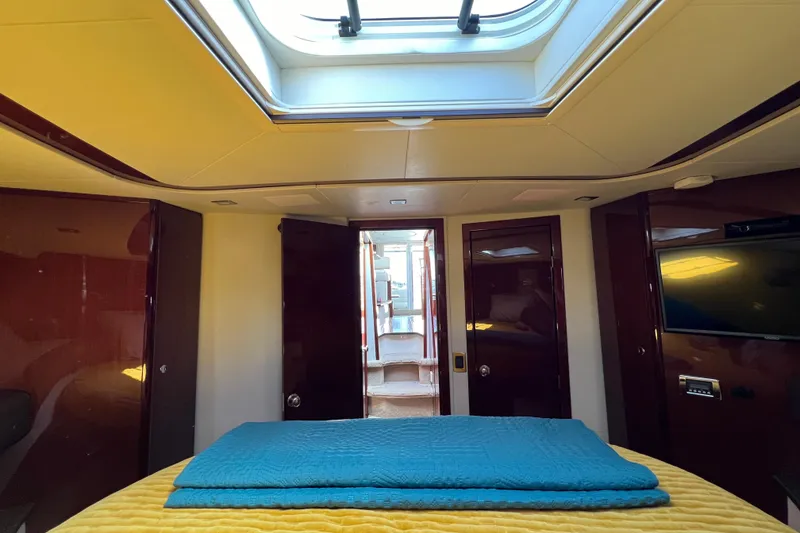 Slide: The Image of Luxurious interior of 2013 Meridian 441 Sedan yacht with skylight and modern amenities. - 40