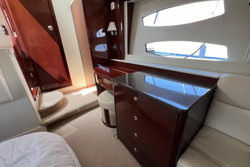 Slide: The Image of Luxurious interior of 2013 Meridian 441 Sedan yacht with elegant wood finishes. - 46
