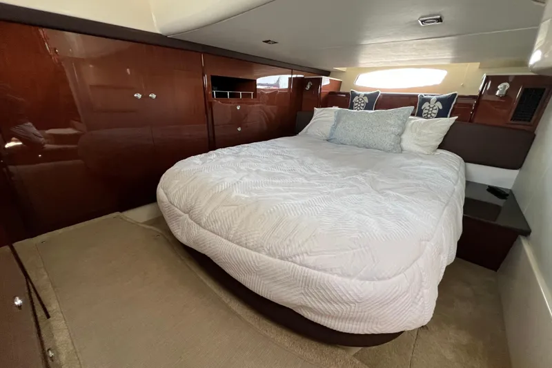 Slide: The Image of Luxurious bedroom interior of 2013 Meridian 441 Sedan yacht with plush bedding. - 47