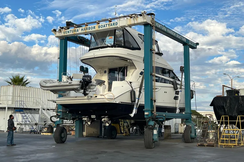 Slide: The Image of 2013 Meridian 441 Sedan yacht at Ventura Harbor Boatyard, lifted for maintenance. - 53