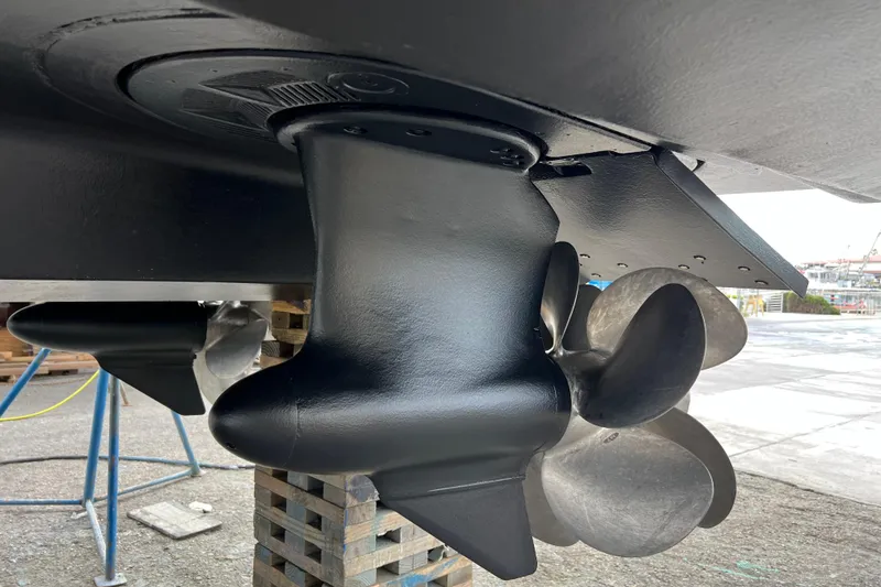 Slide: The Image of Close-up of 2013 Meridian 441 Sedan boat propeller and rudder system. - 55