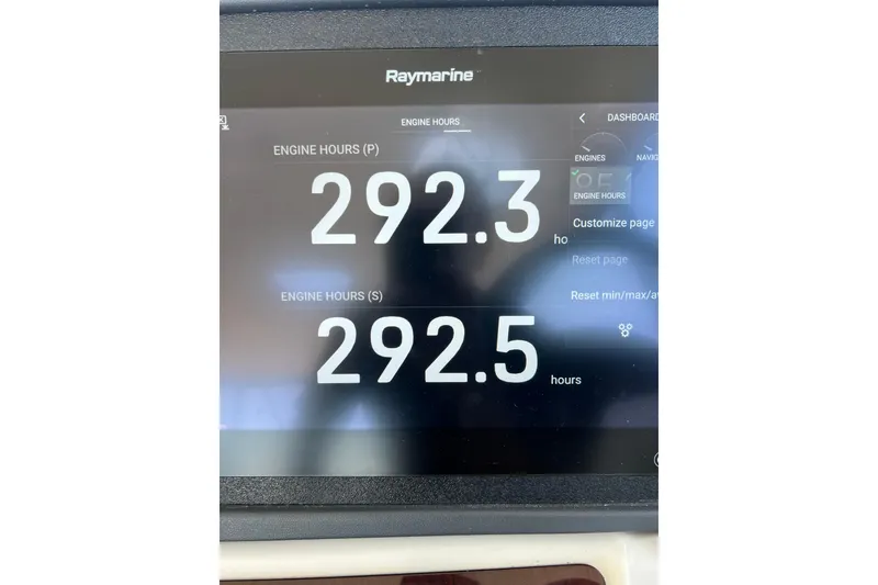 Slide: The Image of Raymarine display showing engine hours for 2013 Meridian 441 Sedan: 292.3 and 292.5 hours. - 59