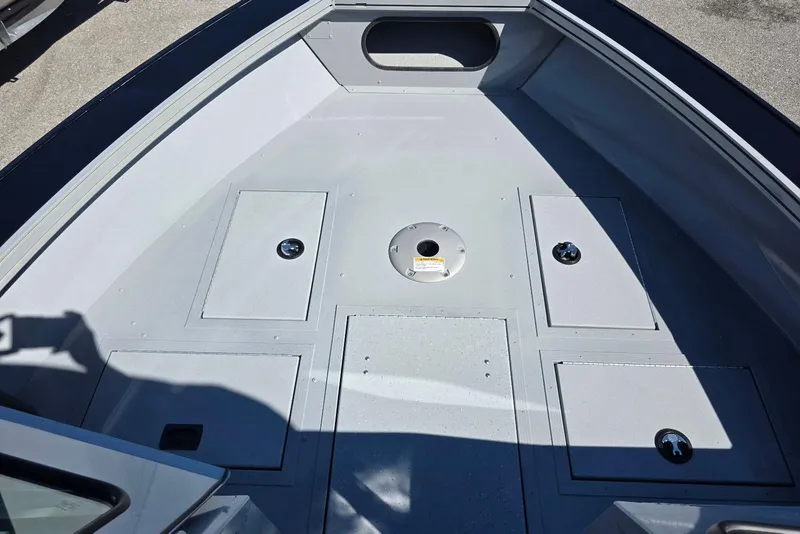 Slide: The Image of 2026 Smoker Craft Avenger 188 HD Pro boat interior with storage compartments. - 10