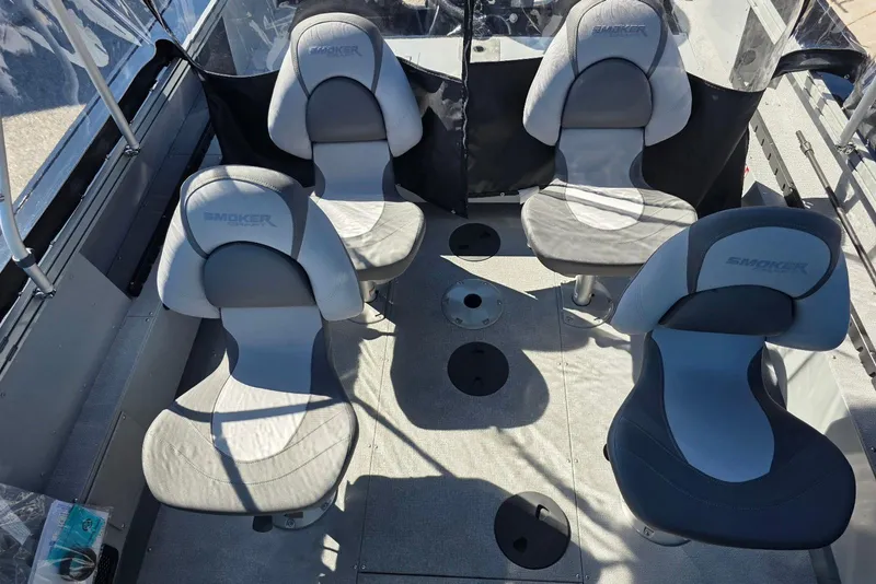 Slide: The Image of 2026 Smoker Craft Avenger 188 HD Pro boat interior with four cushioned seats. - 14