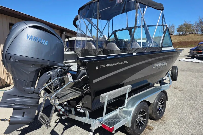 Slide: The Image of 2026 Smoker Craft Avenger 188 HD Pro boat with Yamaha engine on trailer. - 3