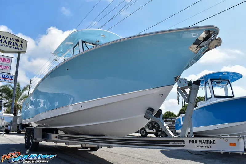 Slide: The Image of 2019 Sea Hunt Ultra 275 SE boat on trailer at Pro Marine. - 5
