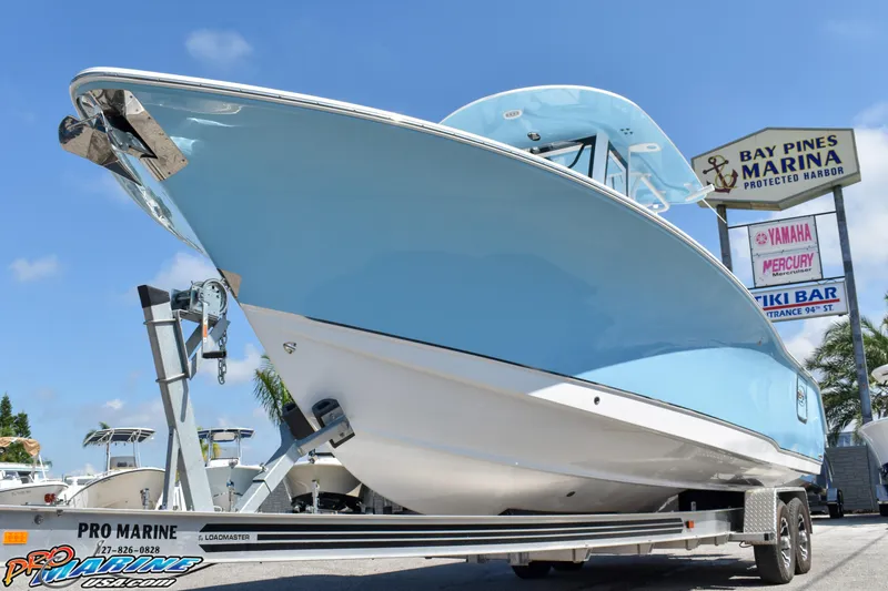 Slide: The Image of 2019 Sea Hunt Ultra 275 SE boat on trailer at Bay Pines Marina. - 7