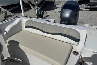 Slide: The Image of 2017 Starcraft 2000 OB Limited boat with seating and outboard motor. - 10