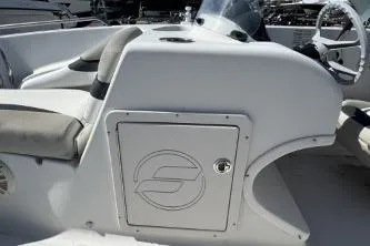 Slide: The Image of 2017 Starcraft 2000 OB Limited boat interior with steering wheel and seating. - 7