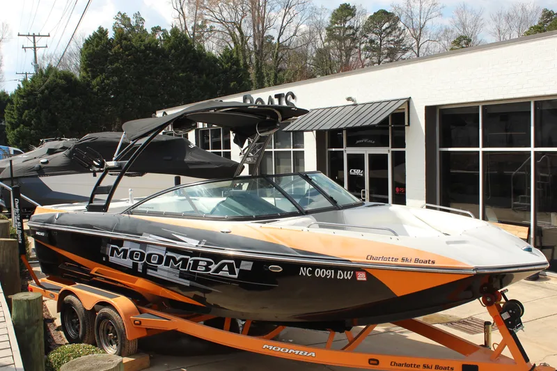 The Image of 2012 Moomba Mojo 2.5 boat on trailer at dealership, Charlotte Ski Boats. - 1