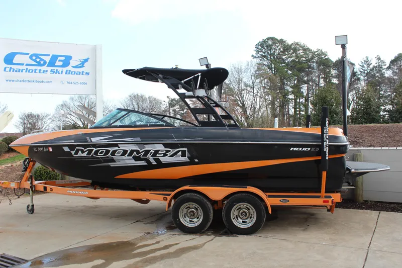 Slide: The Image of 2012 Moomba Mojo 2.5 boat on trailer at Charlotte Ski Boats dealership. - 7