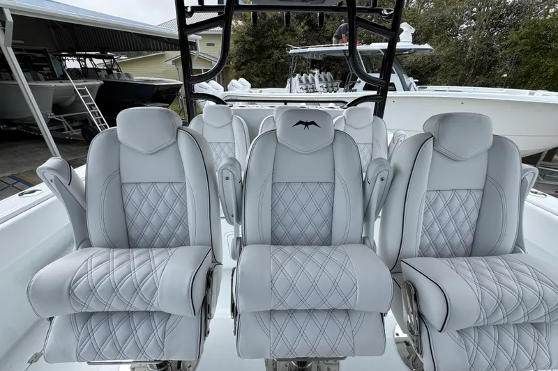 Slide: The Image of Luxurious seating on 2026 Invincible 38 Catamaran, featuring elegant diamond-stitched upholstery. - 30