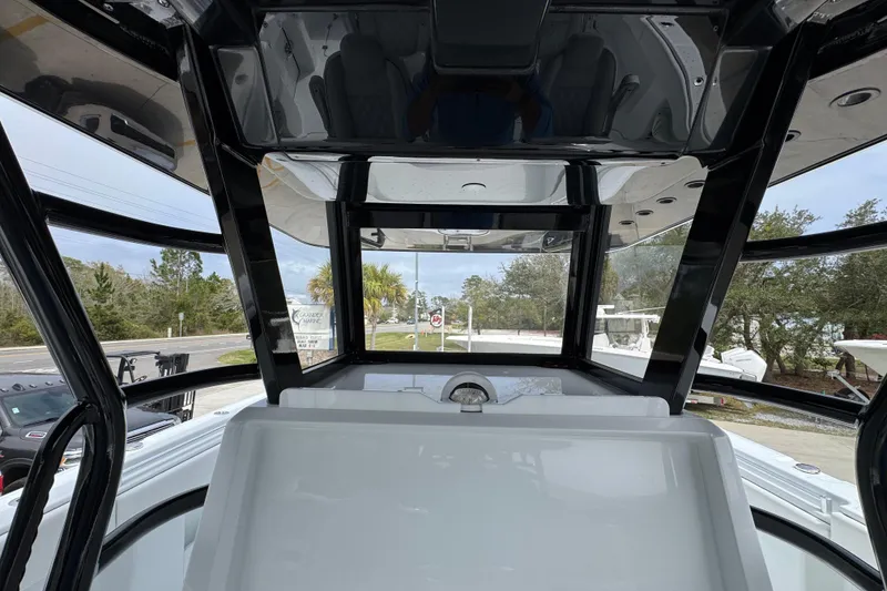 Slide: The Image of Interior view of 2026 Invincible 38 Catamaran, showcasing sleek design and modern features. - 36