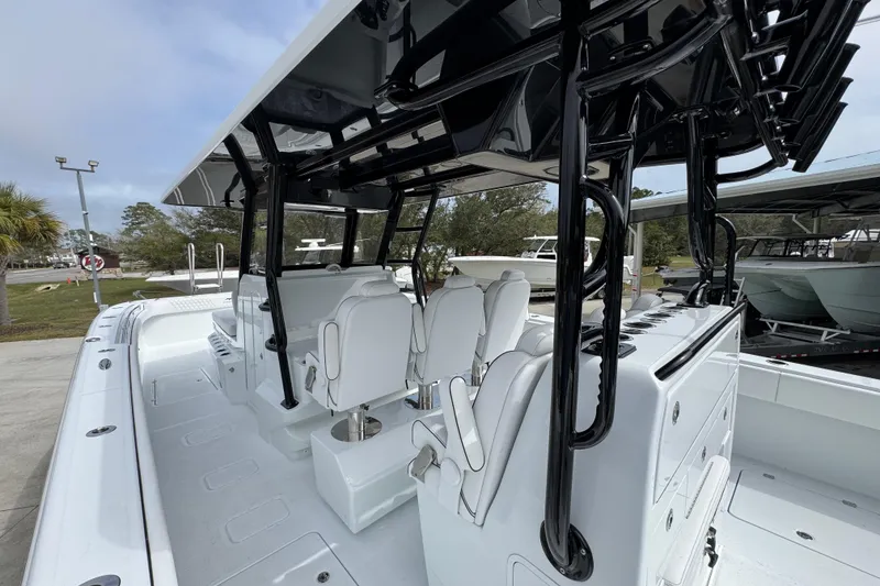 Slide: The Image of 2026 Invincible 38 Catamaran with sleek seating and modern design features. - 38