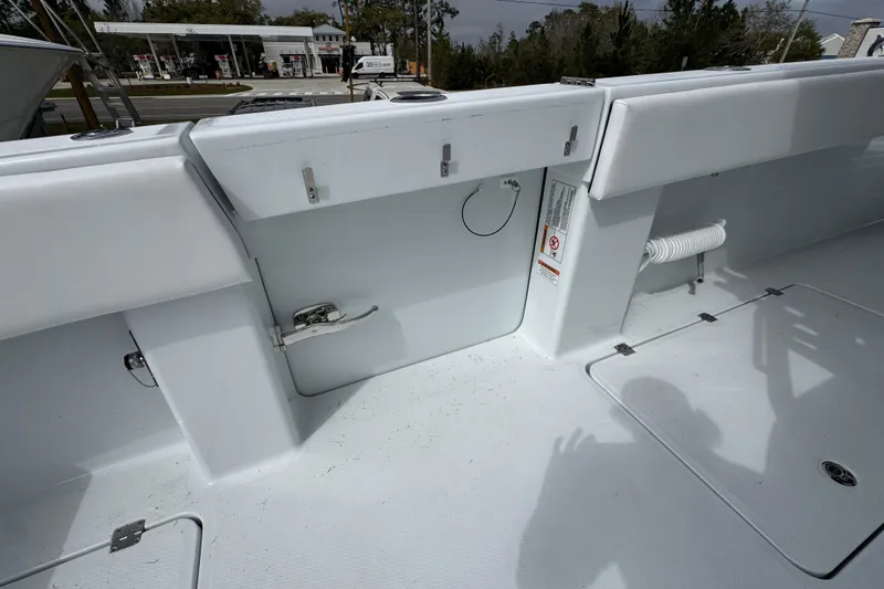 Slide: The Image of 2026 Invincible 38 Catamaran deck with storage compartments and clean white finish. - 42